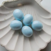 Perla color oliva 21x17 mm in resina opaca - Effetto marmorizzato azzurro x1