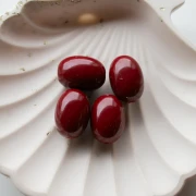 Perla color oliva 21x15 mm in resina opaca - Bordeaux x1