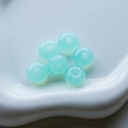 Perle rotonde 12x7 mm in resina traslucida - Verde acqua x6