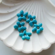 Perlina fiore irregolare in vetro opaco 18x17 mm - Blu turchese x1