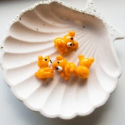 Perlina orsetto in vetro 19x14 mm - Arancione marmorizzato x1