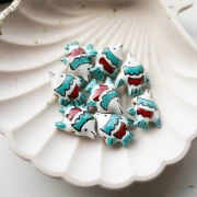 Perla pesce in ceramica 18x21 mm - Bianco - Turchese x1