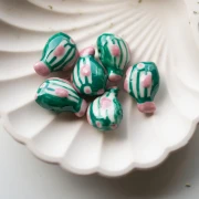 Perla pesce in ceramica 23x16 mm - motivo a strisce - Verde - Rosa x1