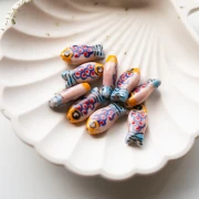 Perlina pesce in ceramica 21x10 mm - Rosa - Arancione - Blu x1