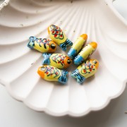 Perlina pesce in ceramica 21x11 mm - Giallo - Arancione - Blu x1