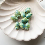 Perla pesce in ceramica 16x13 mm - Verde chiaro - Blu x1