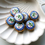 Perla rotonda appiattita in ceramica da 20 mm - fiori - Marrone - Blu x1