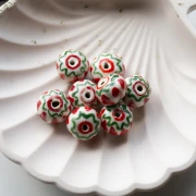 Perlina tonda in ceramica 15x10,5 mm - Rosso - Verde x1