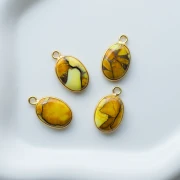 Ciondolo ovale 18x11 mm in pietra semipreziosa - Turchese Oyster Giallo x1