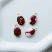 Ciondolo ovale 18x11 mm in pietra semipreziosa - Turchese Oyster Rouge x1