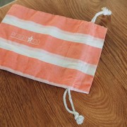 Regalo - Astuccio in cotone a righe con logo Perla and Co