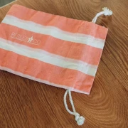 Regalo - Astuccio in cotone a righe con logo Perla and Co