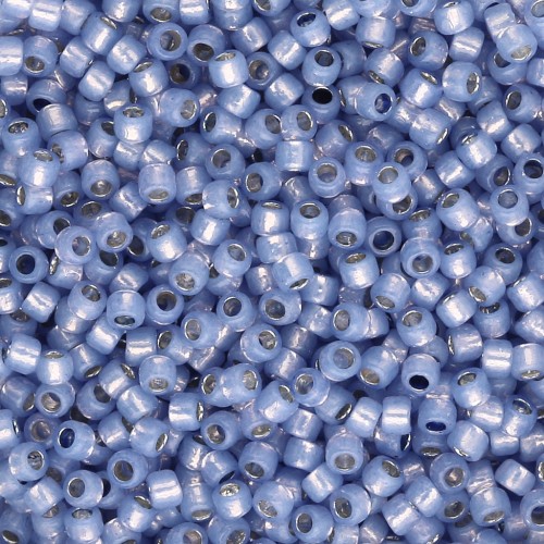 Rocaille Toho Takumi LH 11/0 TAK11R-PF2123 - PF Milky Sapphire con bordatura argentata x8g