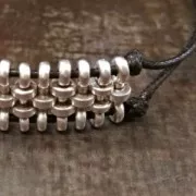 Distanziatore con rondella 12 mm per laccetti di 1.5 mm Dorato con oro fino