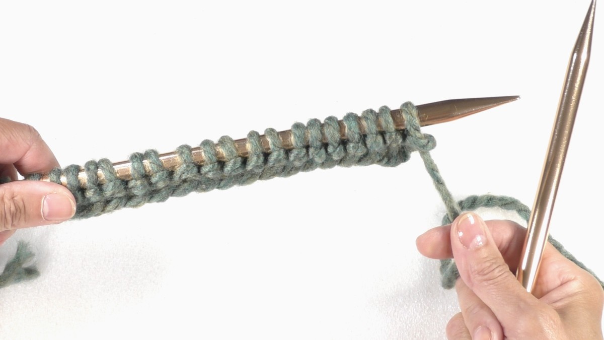 Come faccio a lavorare a maglia un punto purl? : Tappa 23