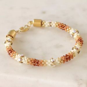 bracelet tiss&eacute; avec embouts