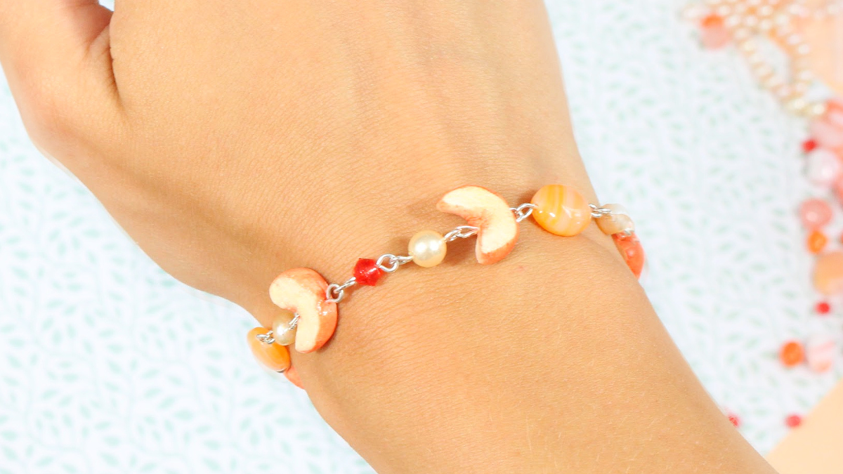 Schema Bracciale misto di pesca e perline in argilla polimerica