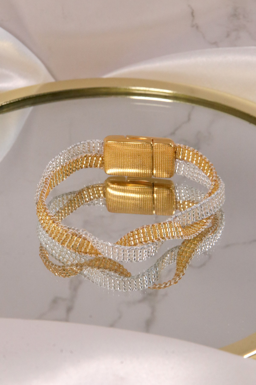 Bracciale Miyuki intrecciato in argento e oro
