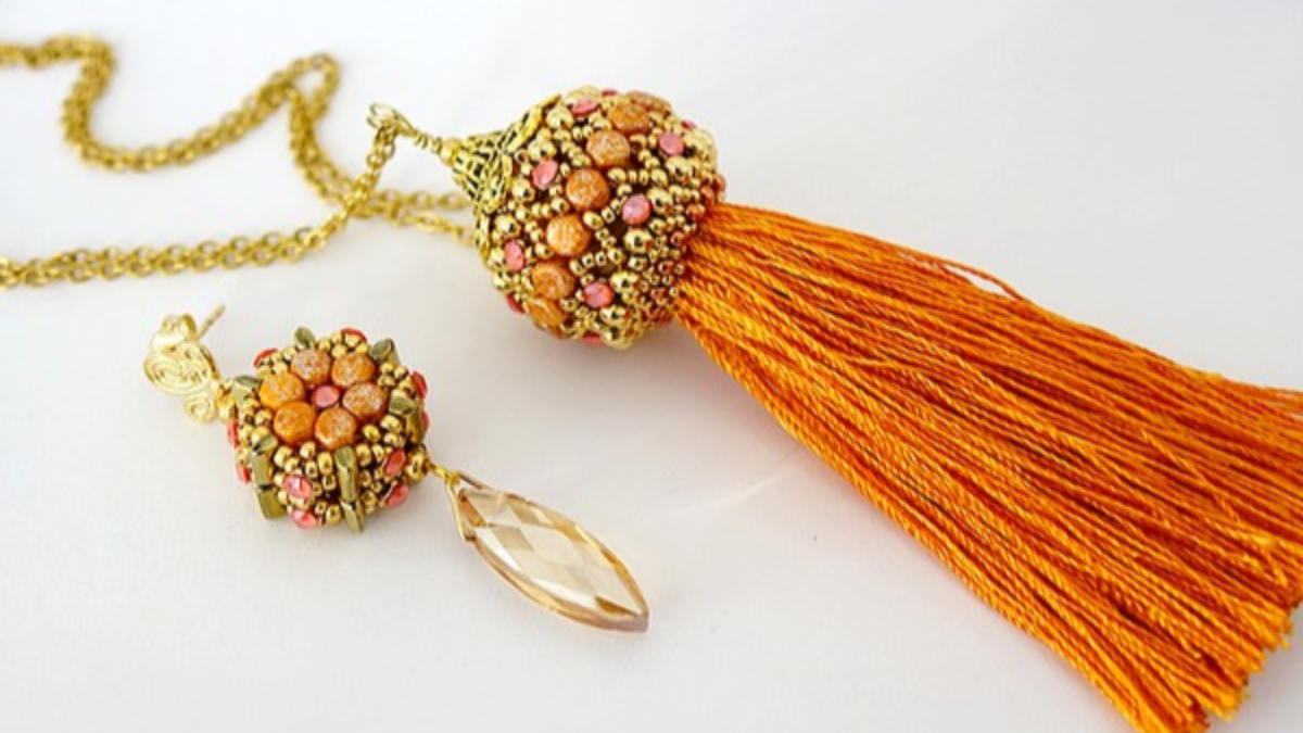 Tuto Bag gioielli "Léa et Lucie" con perline Kalos e Piros e supporto in legno Jeff and Jack Tuto Bag gioielli "Léa et Lucie" con perline Kalos e Piros e supporto in legno Jeff and Jack