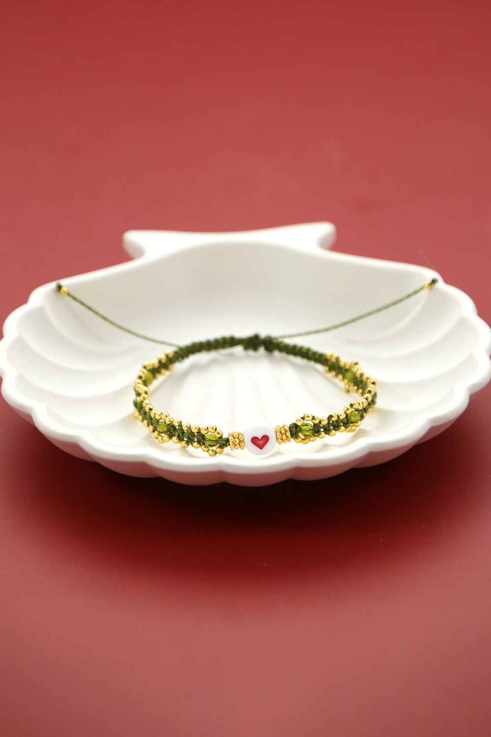 Schema DIY Piccolo braccialetto in micro macramé color cachi con perline dorate