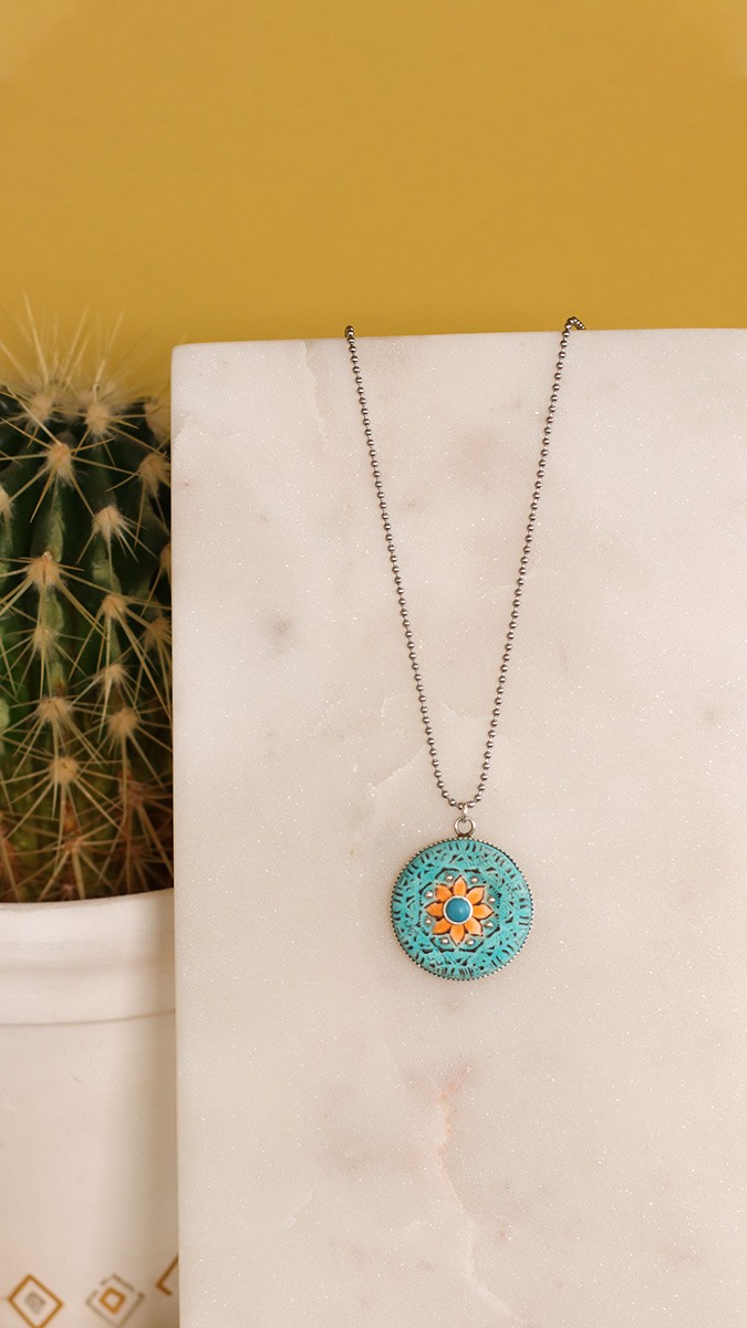 Ciondolo mandala polimerico con montatura in argento