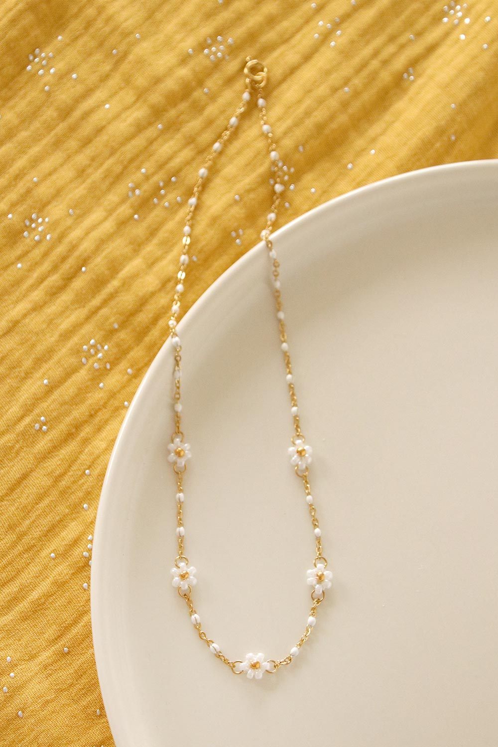 Schema Collana fai da te in acciaio inox oro con piccoli fiori di perla