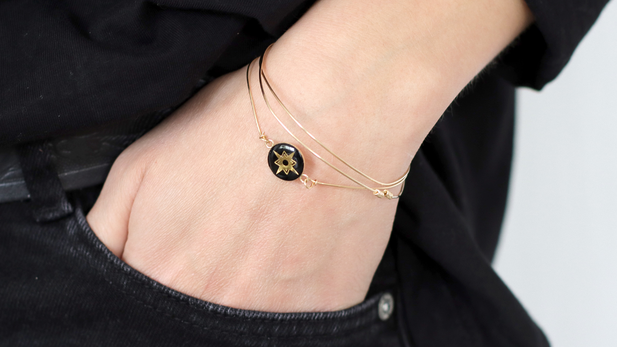 Bracciale Tuto in resina nera opaca riempito d'oro