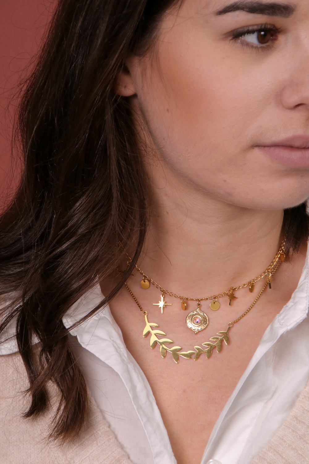 Schema Due collane in acciaio inossidabile con ramo pendente placcato oro Schema Due collane in acciaio inossidabile con ramo pendente placcato oro