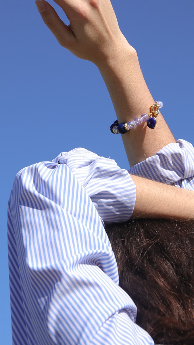 Schema Bracciale con grandi perle rotonde trasparenti e striate