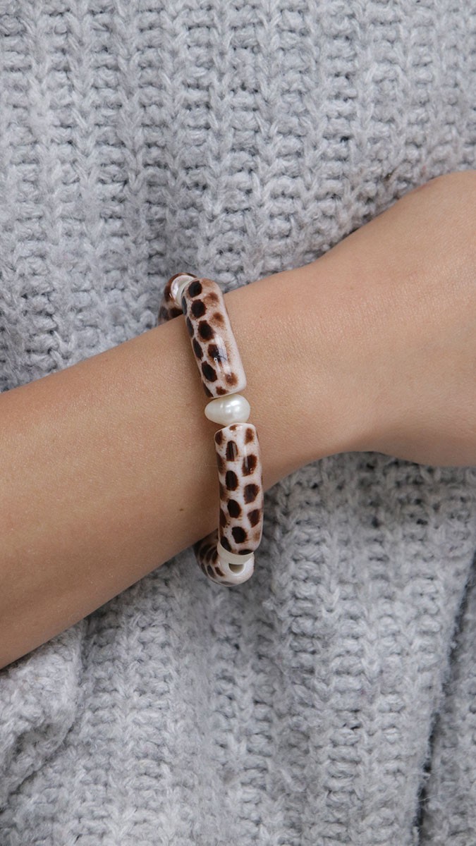 Schema Braccialetti elastici con perline tubolari fantasia