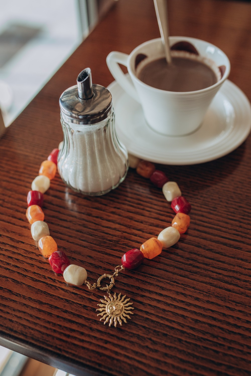 Schema Collana di perle colorate XXL con pendente a forma di sole