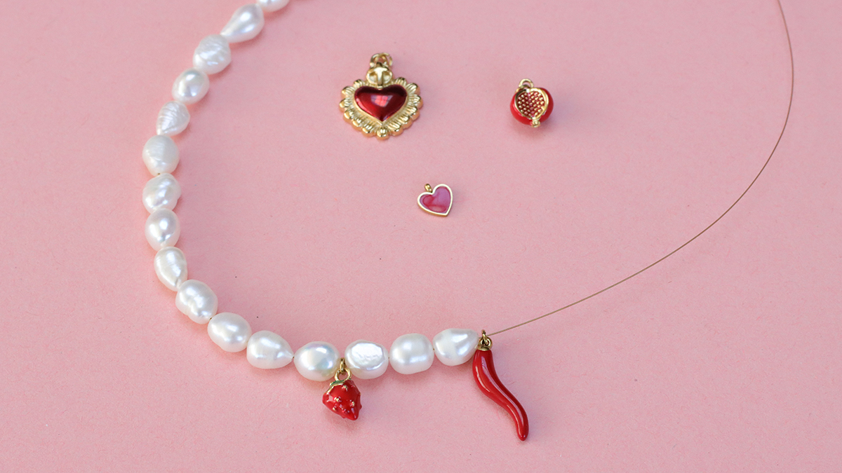 Collana con ciondolo a forma di cuore con fiocco placcato oro 18 carati collana