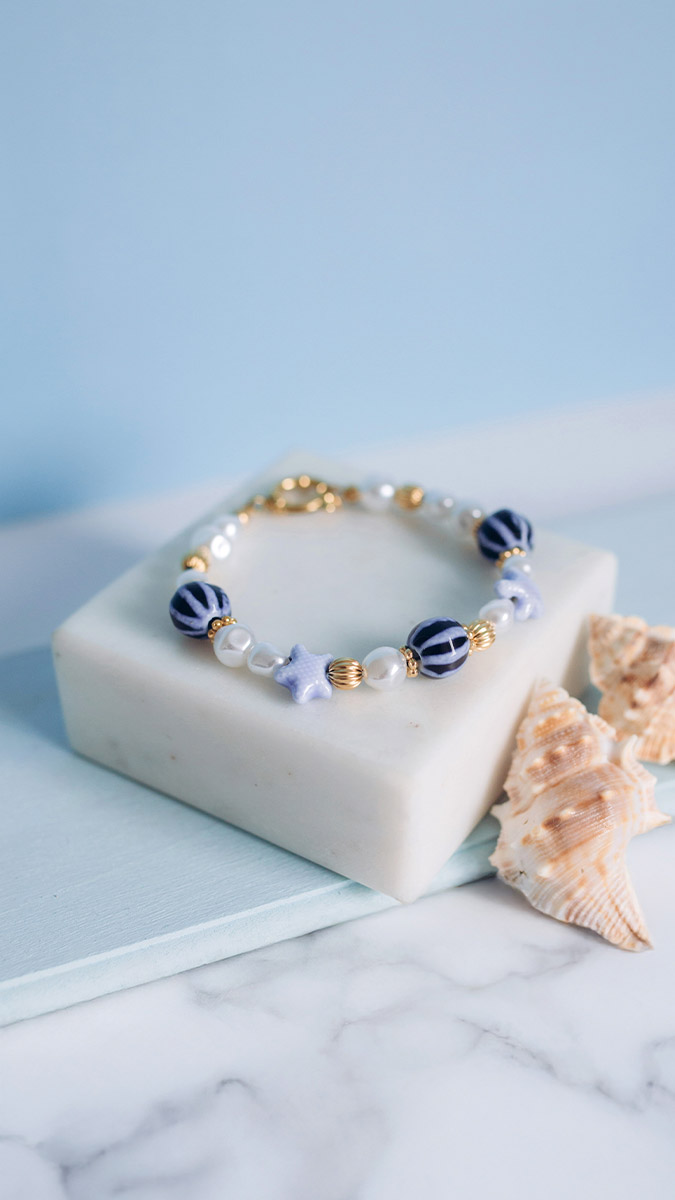 Schema Bracciale in ceramica e imitazione di perle d'acqua dolce