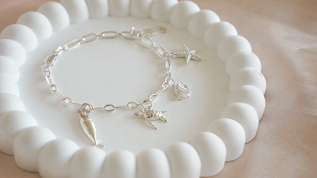 Schema Bracciale con charms marini in argento 925 Schema Bracciale con charms marini in argento 925