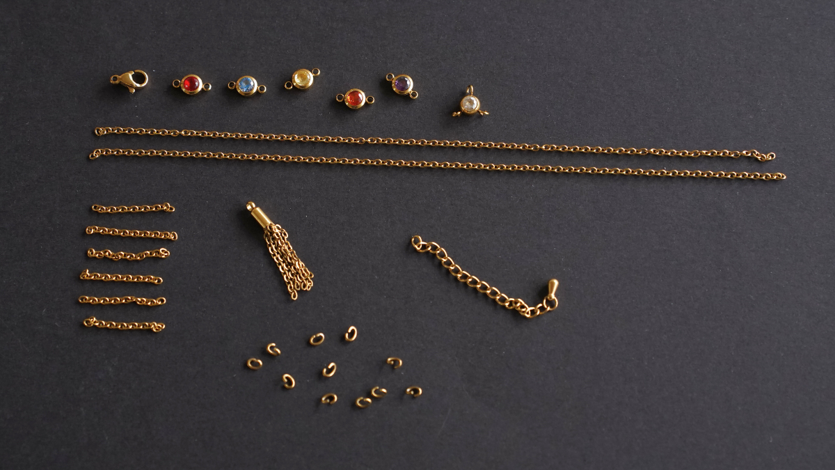 Collana a cascata con zirconi e pompon in acciaio inossidabile : Tappa 1