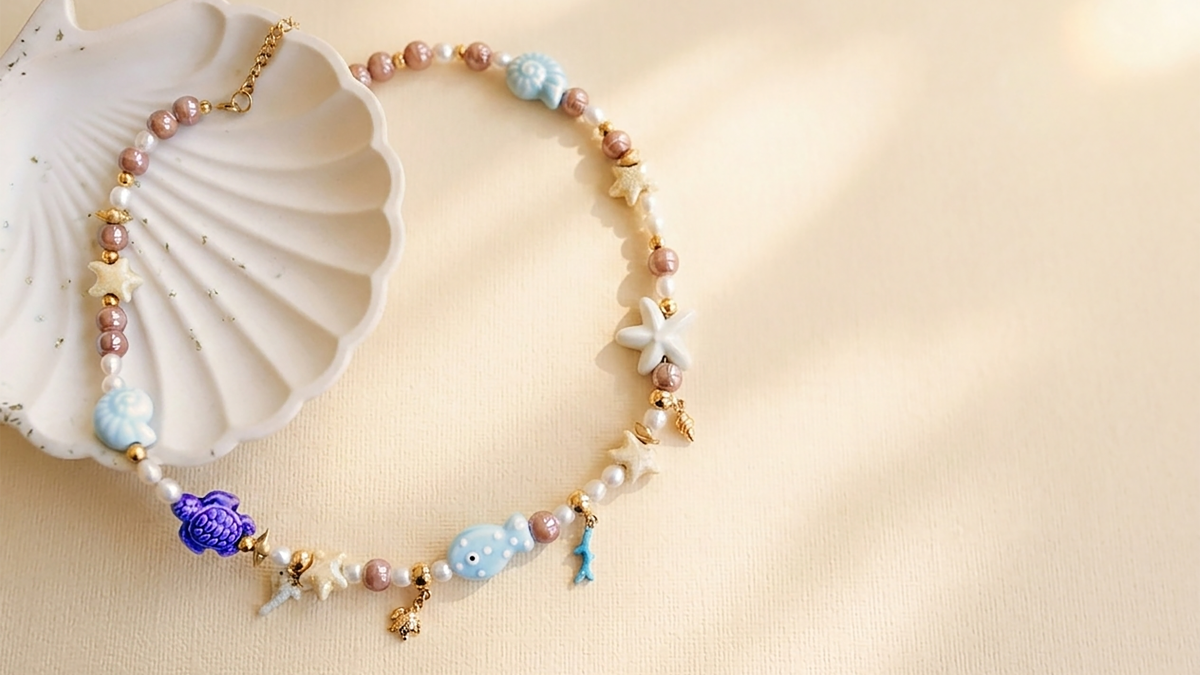 Schema Collana con perle di ceramica e perle d'acqua dolce