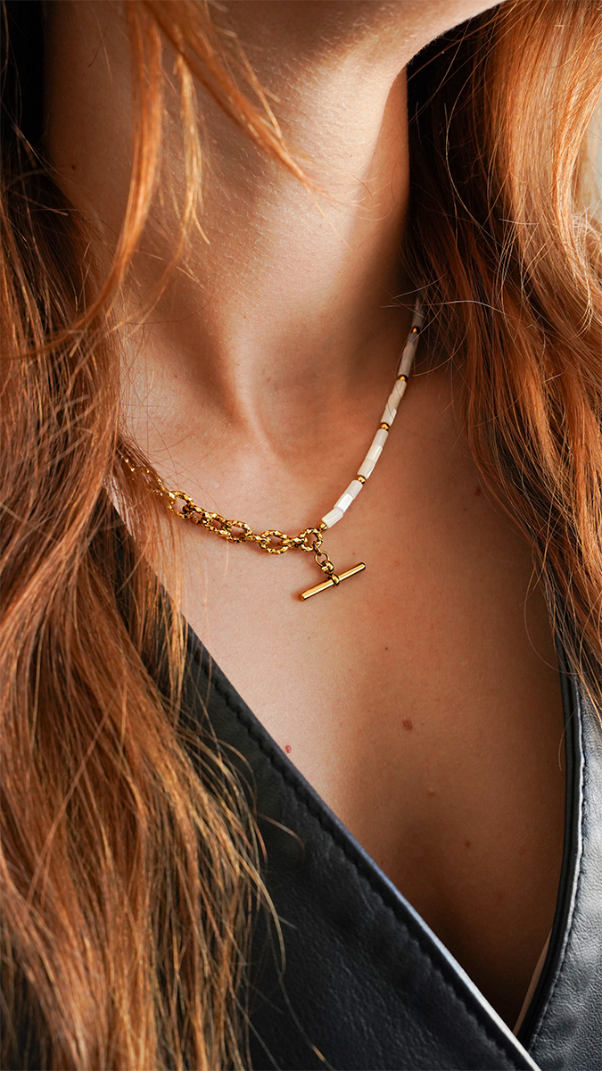 Collana con barrette e perline tubolari in madreperla