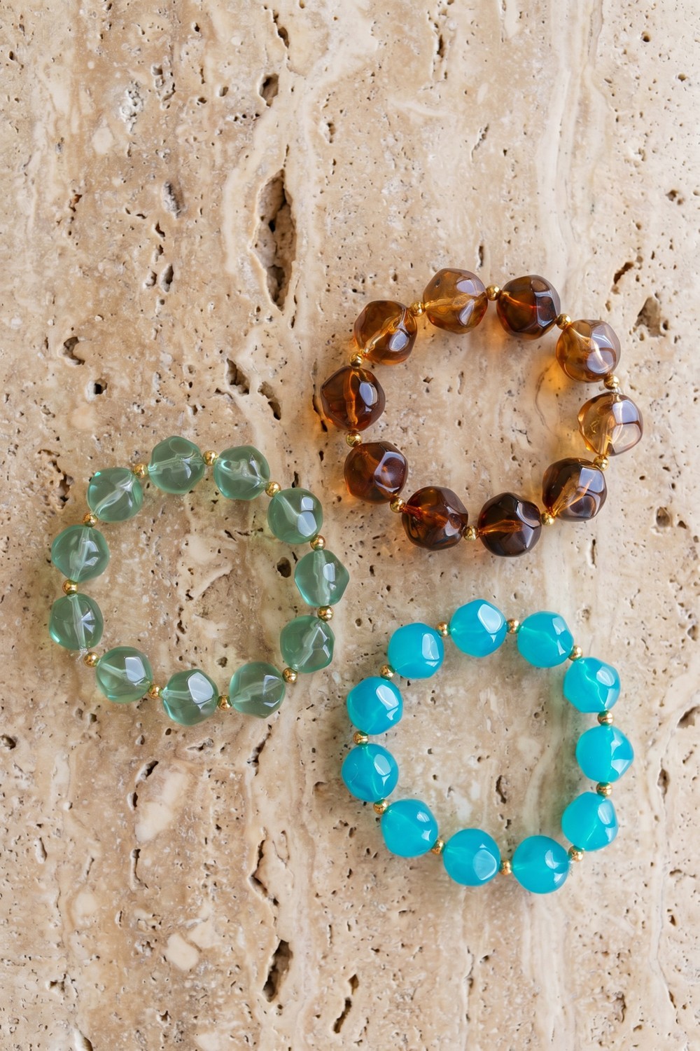 Schema Braccialetti con perline rotonde in resina